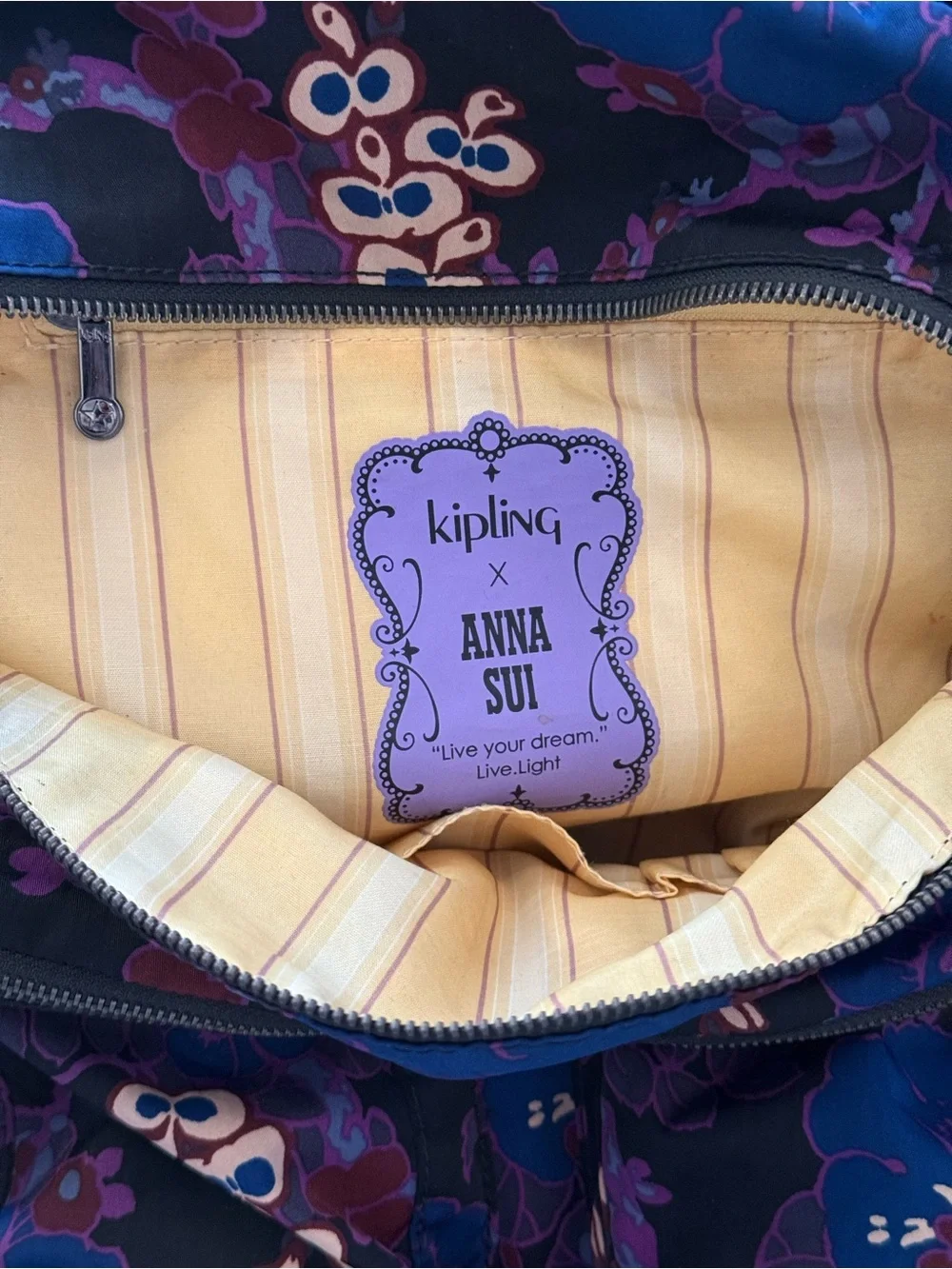 Kipling Black Floral Mini Backpack with Purple Accents